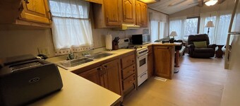 New improved Camper/RV in Sussex, New Jersey. Outdoor vacation in campground.