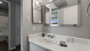 Hair dryer, towels, soap, toilet paper