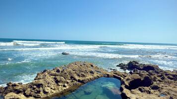 On the beach, beach towels