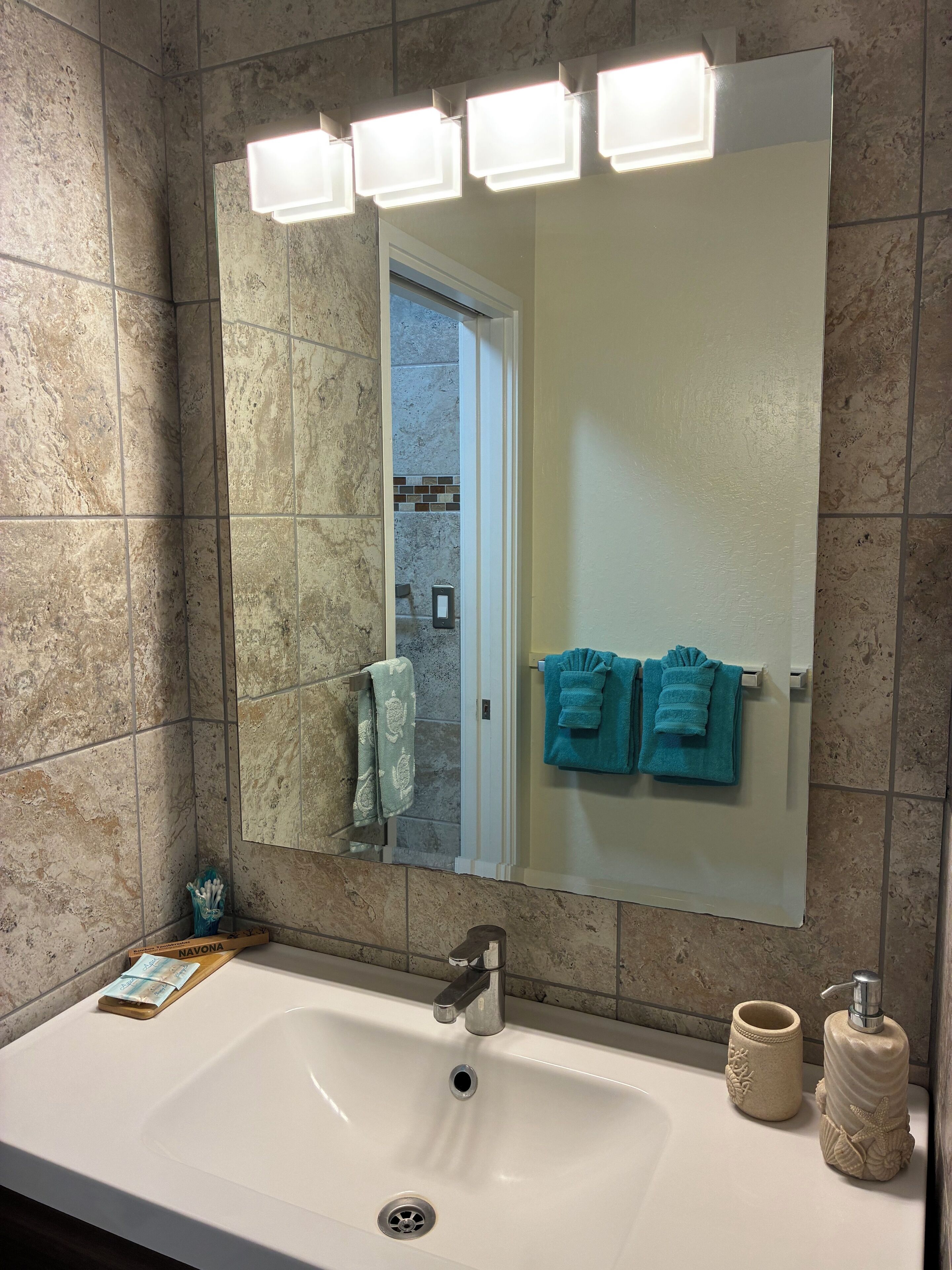 Hair dryer, towels, soap, shampoo