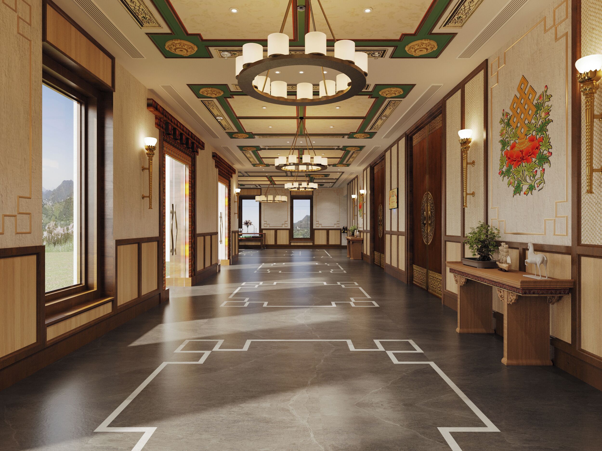 A hotel corridor with a patterned floor, wooden paneling, a chandelier, and a reception desk with a plant.
