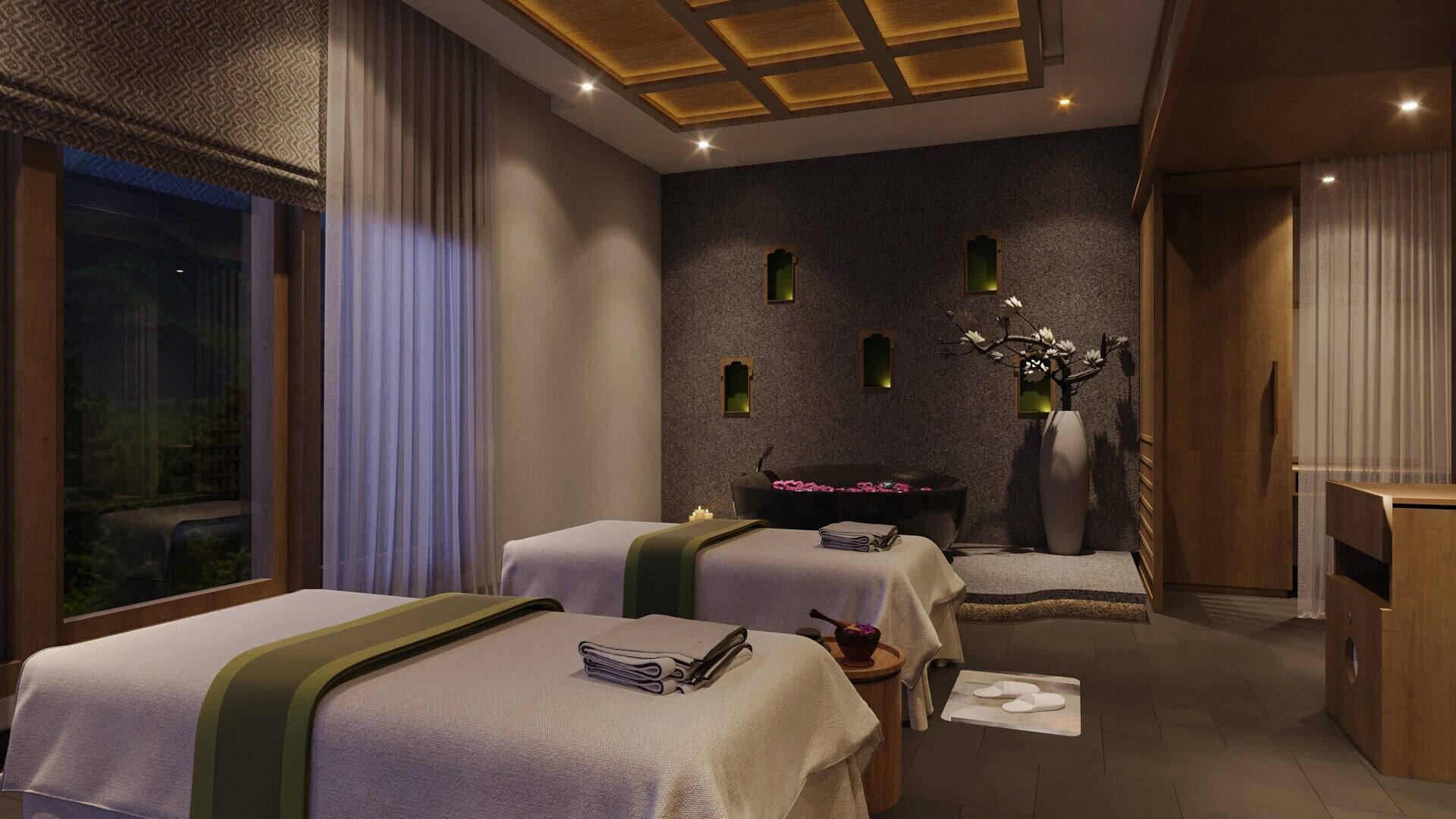 A modern spa room with two beds, a massage table, a bathtub, and a large window.
