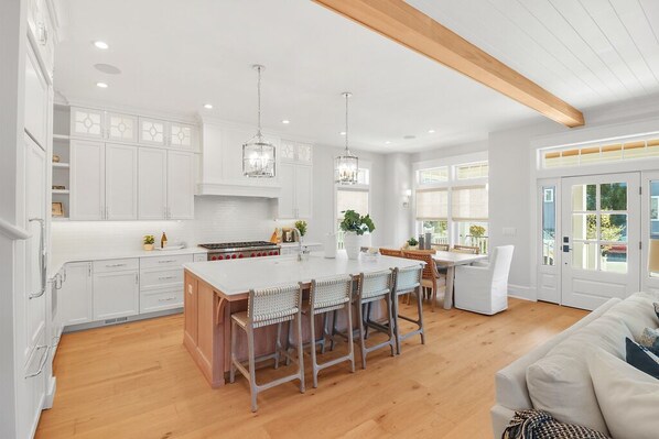 Fridge, microwave, oven, stovetop - Elegant 6-Bedroom Condo—Garage & Porch Bliss (Ocean City)