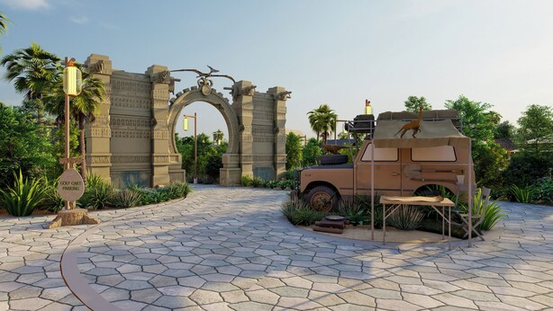 A paved pathway leading to an ornate stone archway with a golf cart parked nearby. - T-Rex Glamping, Dubai Parks and Resorts (Dubai)