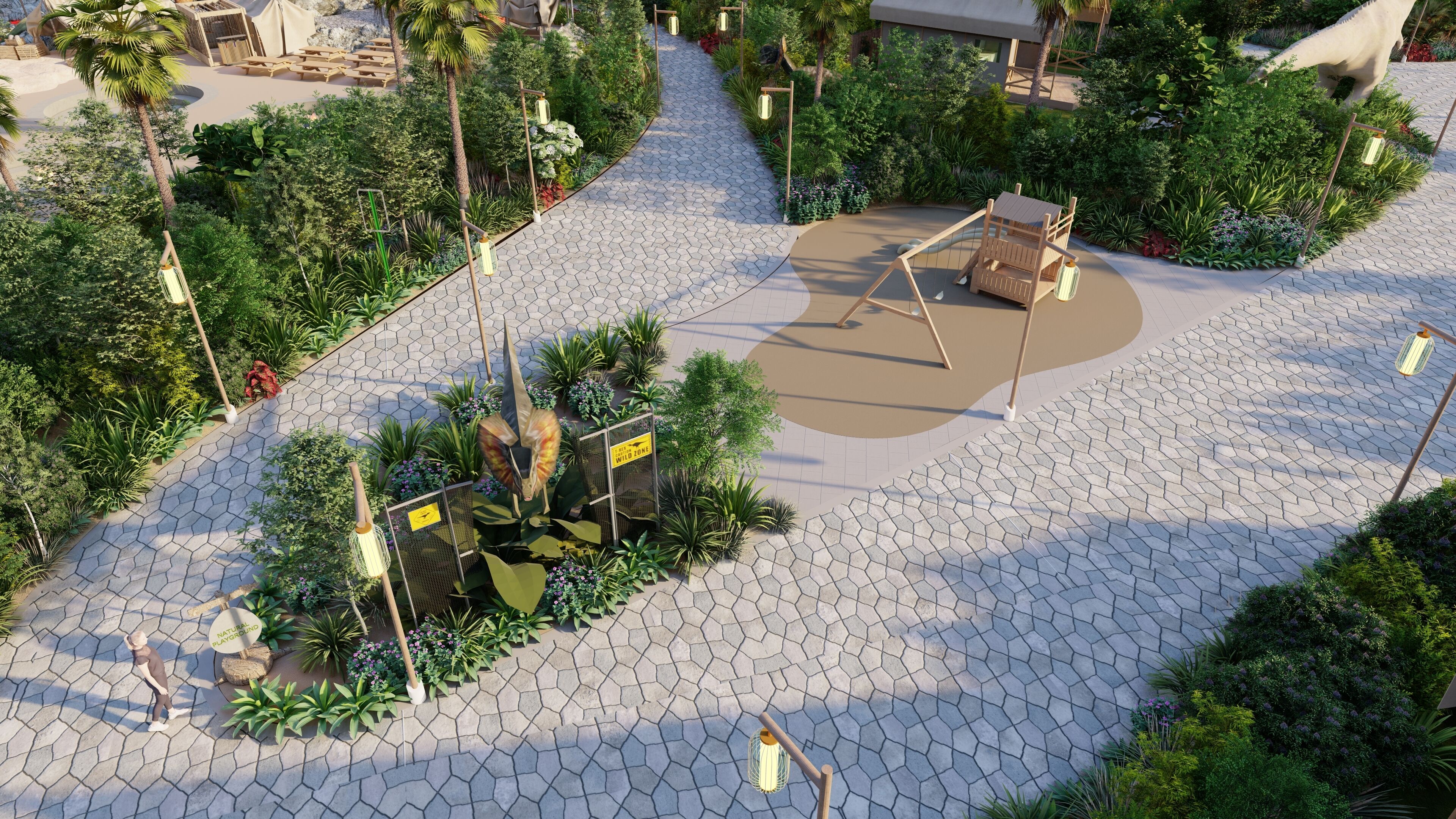 A playground area with hexagonal paving, surrounded by lush greenery and palm trees.