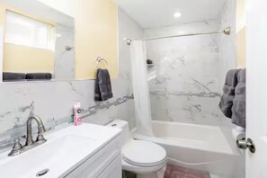 Hair dryer, towels, soap, toilet paper