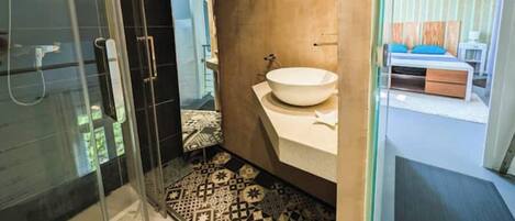 Shower, hair dryer, towels, toilet paper