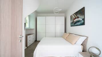 2 habitaciones, caja de seguridad en la habitación y escritorio