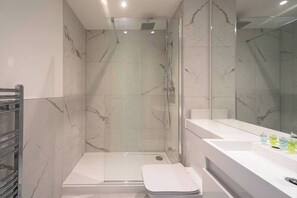 Shower, free toiletries, hair dryer, towels