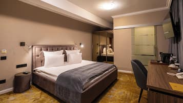 Cortinas blackout, ferros/tábuas de passar roupa, Wi-Fi de cortesia