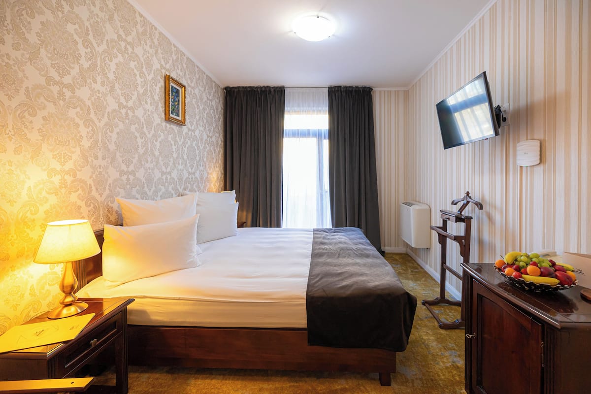 Standard Double Room, Balcony, City View | Blackout drapes, iron/ironing board, free WiFi