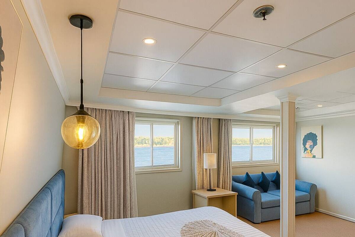 Deluxe Suite, River View | In-room safe, blackout drapes, soundproofing