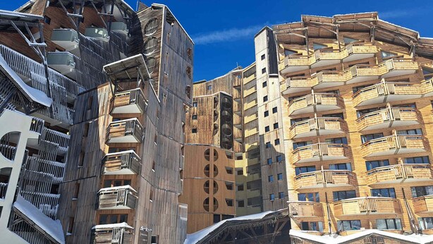 A modern ski resort building with multiple balconies and a ski lift visible. - 3-room apartment, sleeps 6 in Avoriaz (Avoriaz)