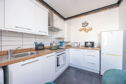 Stylish Stay Steps from Lively Docks