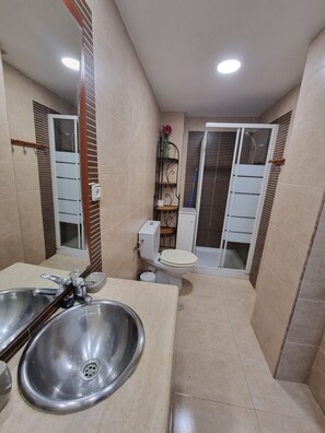 Hair dryer, towels, soap, toilet paper