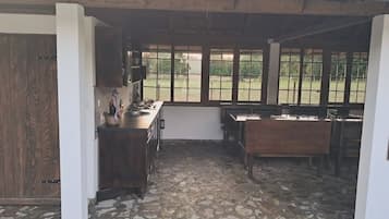 Coffee/tea maker, fridge, cookware/dishes/utensils