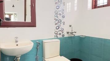 Bidet, towels, soap, toilet paper