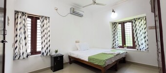 Halcyon Homes - Delightful 2-bedroom house with AC in Thiruvananthapuram