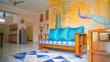 Departamento Deluxe, 1 habitación | Área de sala de estar