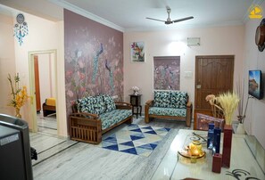 Departamento Premium, 2 habitaciones | Área de sala de estar