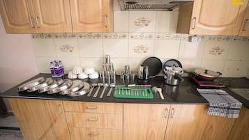 Fridge, stovetop, cookware/dishes/utensils