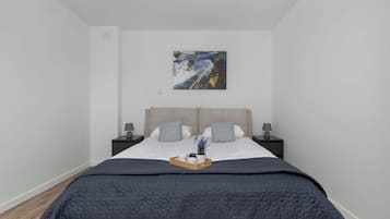 3 habitaciones, tabla de planchar con plancha, wifi y ropa de cama