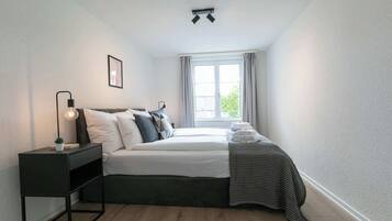 1 slaapkamer, een strijkplank/strijkijzer, wifi, beddengoed