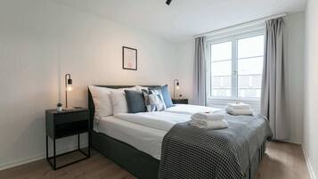 1 slaapkamer, een strijkplank/strijkijzer, wifi, beddengoed