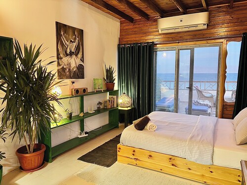 Beach front studio with huge roof top terrace