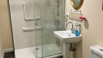 Shower, towels, toilet paper