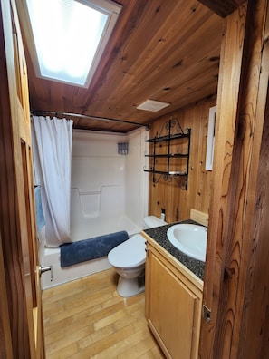 Bidet, towels, soap, toilet paper