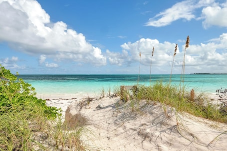 On the beach, sun loungers, beach towels