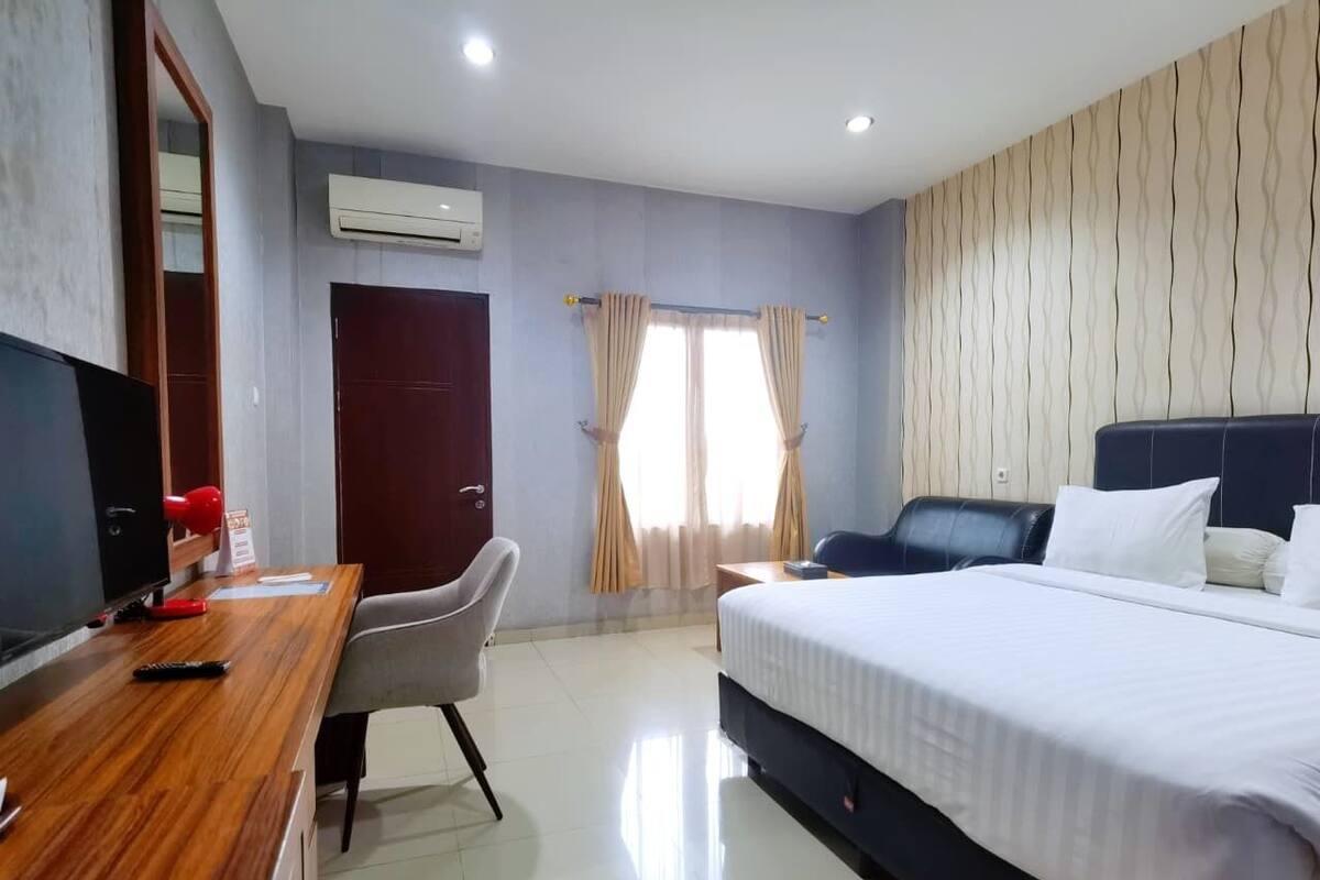 Deluxe Double Room, Balcony, River View | Desk, free WiFi