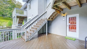 A wooden deck with a white railing and a wooden staircase leading to a second-story balcony. - Families Welcome! Sugar Mtn Gem: Golf, Hike & Ski (Banner Elk)