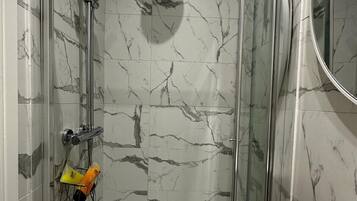 Shower, free toiletries, hair dryer, towels