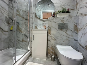 Shower, free toiletries, hair dryer, towels