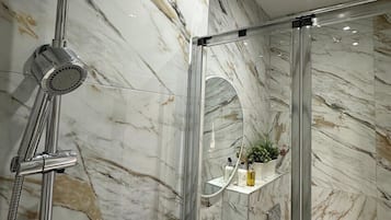 Shower, free toiletries, hair dryer, towels