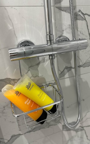 Shower, free toiletries, hair dryer, towels