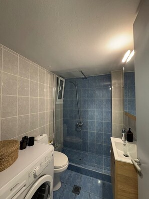 Hair dryer, towels, soap, toilet paper