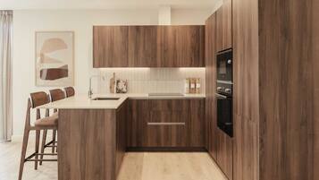 Apartment, 3 Bedrooms | Private kitchen | Fridge, microwave, oven, dishwasher