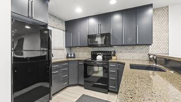 Condo, 2 Bedrooms | Private kitchen | Fridge, coffee/tea maker, toaster