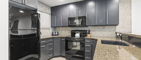Condo, 2 Bedrooms | Private kitchen | Fridge, coffee/tea maker, toaster