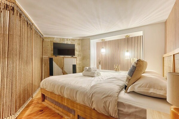 1 bedroom, desk, iron/ironing board, travel crib