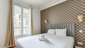 2 slaapkamers, een strijkplank/strijkijzer, reisbedje, wifi