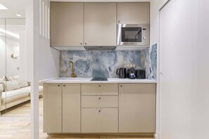 Fridge, microwave, coffee/tea maker, toaster