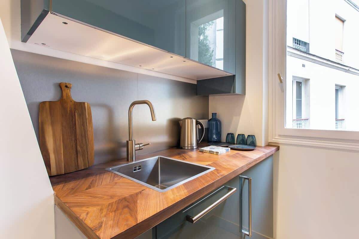 Fridge, coffee/tea maker, cookware/dishes/utensils