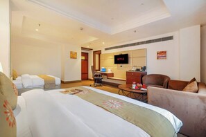 Family Room | Premium bedding, down comforters, desk, laptop workspace