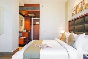 Deluxe Room, City View | Premium bedding, desk, free WiFi, bed sheets