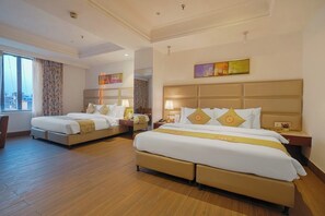 Family Room | Premium bedding, down comforters, desk, free WiFi - BluSalzz Select City Centre near Golden Temple (Amritsar)