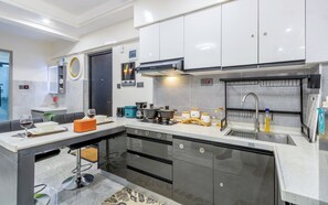 Fridge, microwave, stovetop, coffee/tea maker